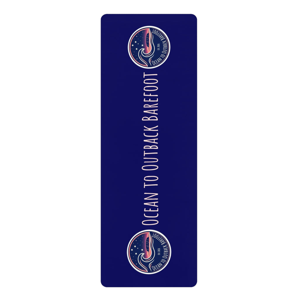 A tall, narrow navy blue rectangular product with rounded corners, featuring the text 'OCEAN TO OUTBACK BAREFOOT' in white vertical lettering and two circular logo emblems near the top and bottom.