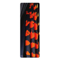 A long, narrow rectangular product featuring a bold black and bright orange cockatoo tail feather pattern, shown against a plain white background.