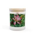 A frosted glass jar candle with a light wood lid, featuring a label with a pink lotus flower on green lily pads. The text 'OCEAN TO OUTBACK BAREFOOT' is printed on the label.
