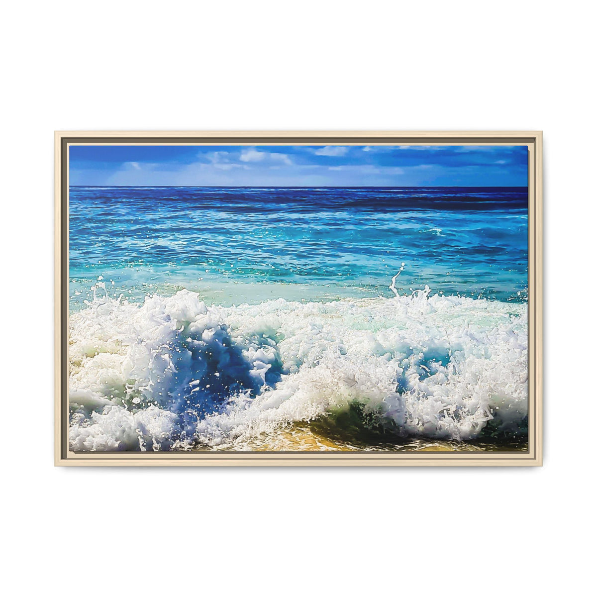 A framed horizontal canvas print of an ocean scene, featuring turquoise and deep blue waves crashing onto a sandy shore under a blue sky, set against a plain white background.